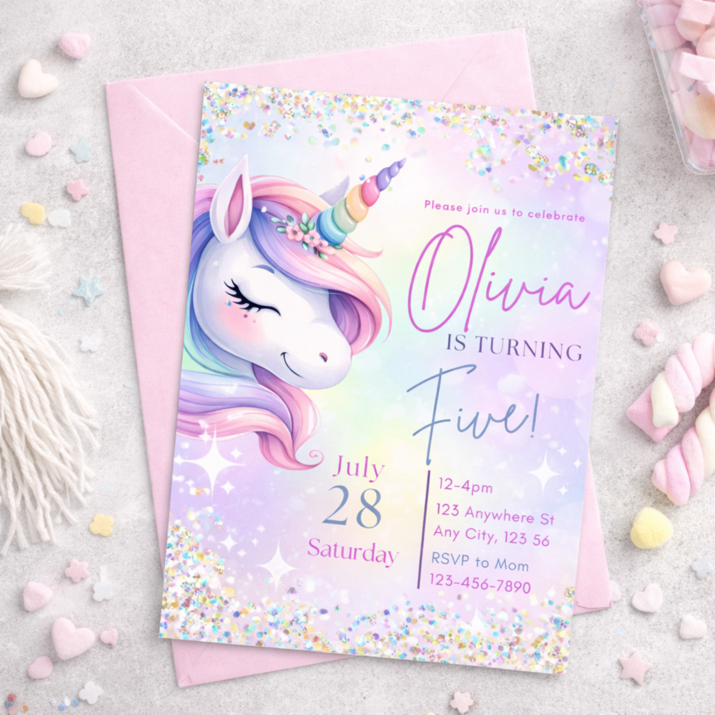 Unicorn-themed birthday invitation card with colorful design on a light gray background.