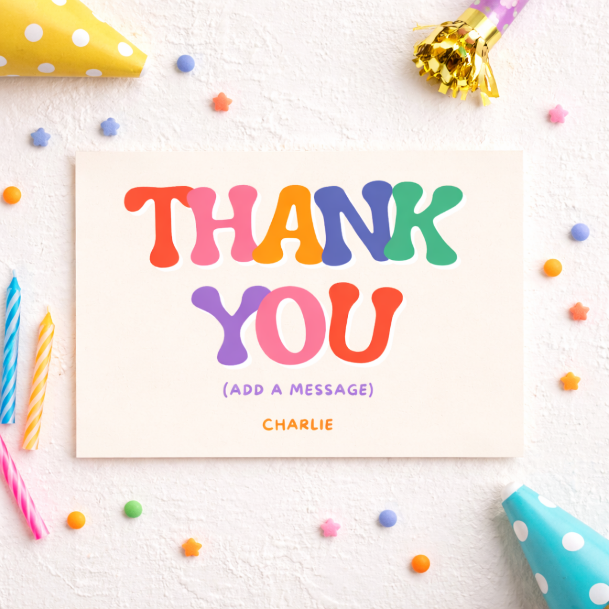 Colorful 'Thank You' card with party supplies on a white background
