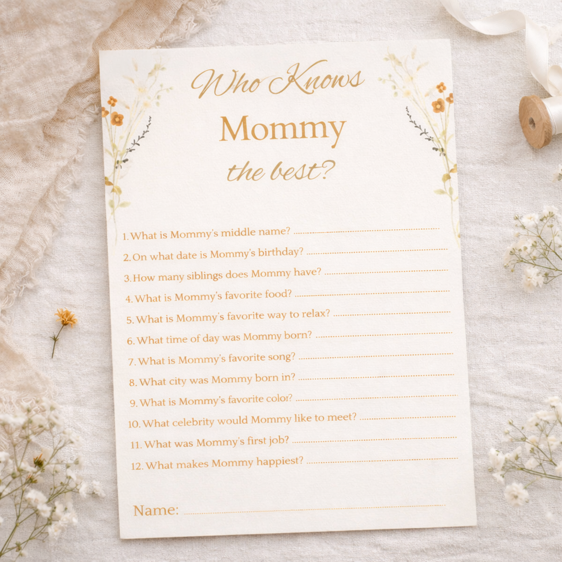 Game card titled 'Who Knows Mommy the best?' on a light background with flowers.