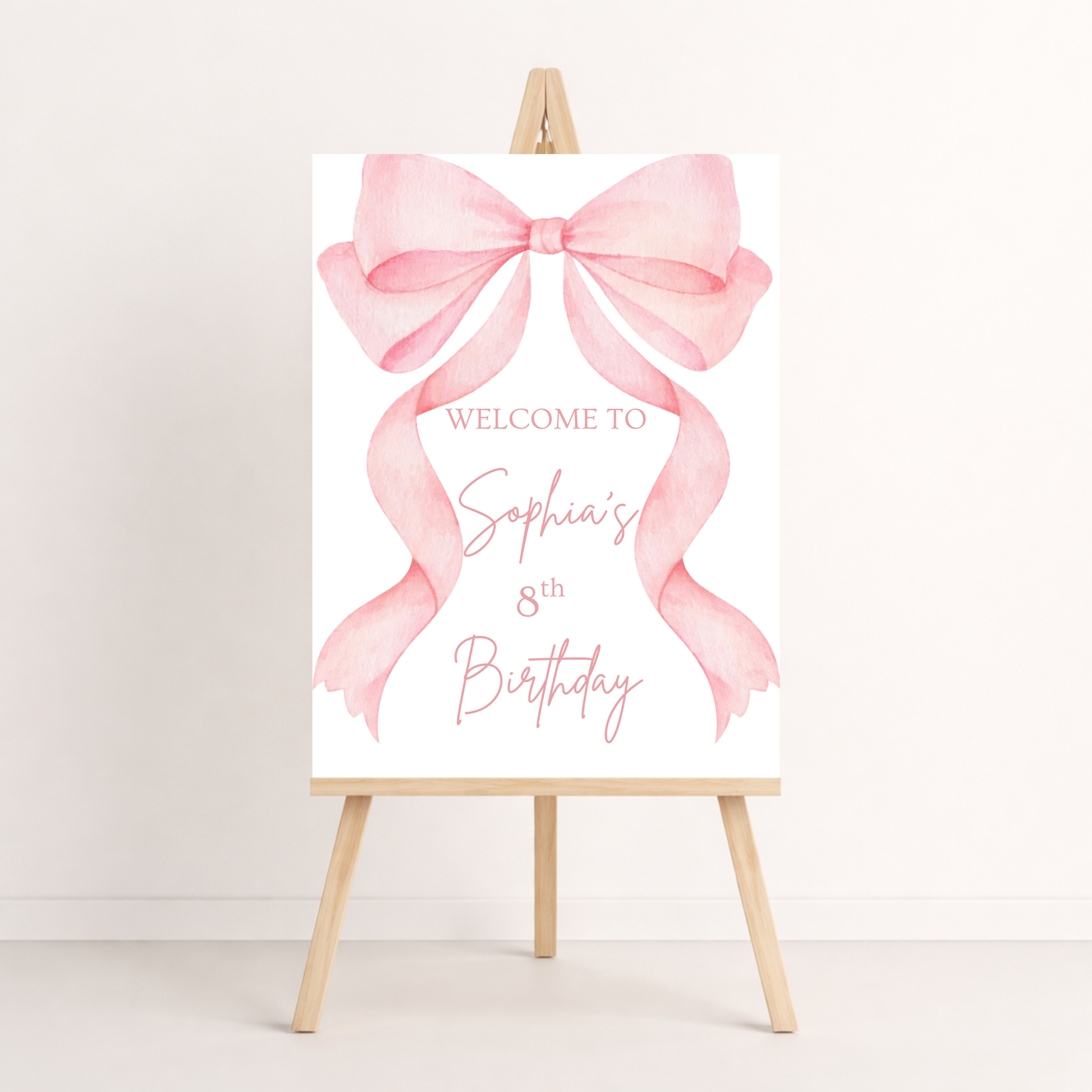Birthday welcome sign with pink bow on a white background