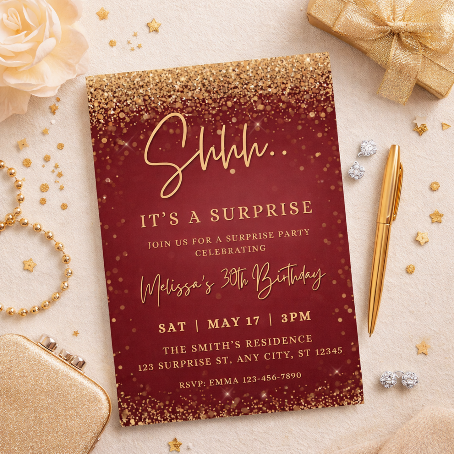 Red and gold birthday invitation with decorative elements on a light background