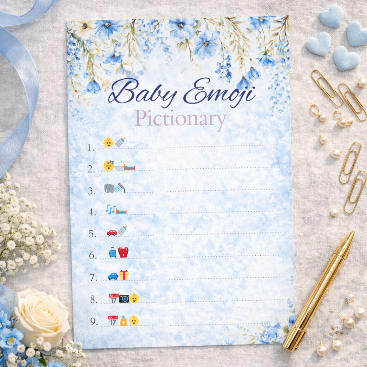 Baby emoji pictunary game sheet with floral design on a decorative background
